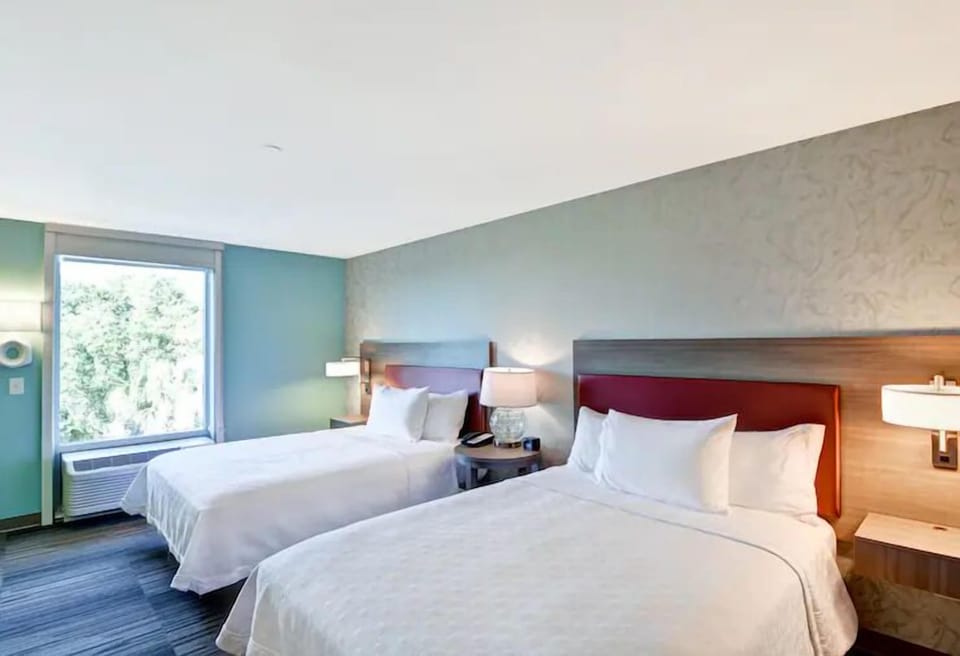 Stretch out on plush double beds for effortless, restful sleep.