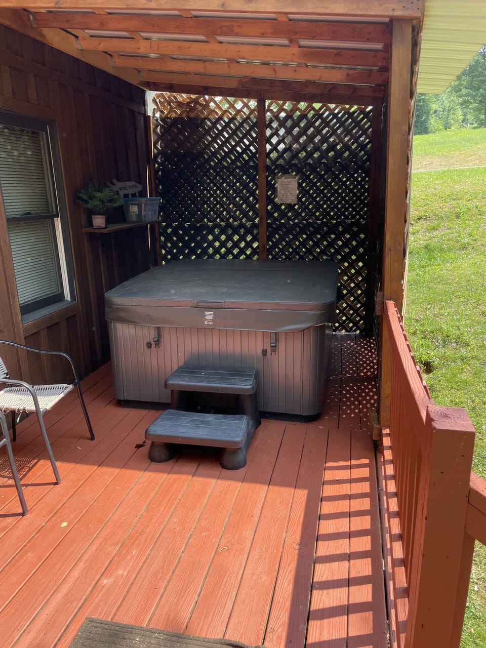 Hot Tub located at main entrance.  Privacy on 3 sides.  