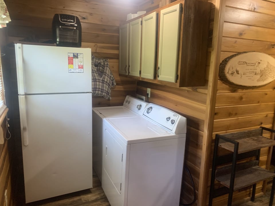 Washer and Dryer - Cold water only on Washing Maching.  Full size Fridge