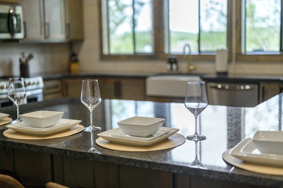 Cheers to a relaxing stay in this charming kitchen space