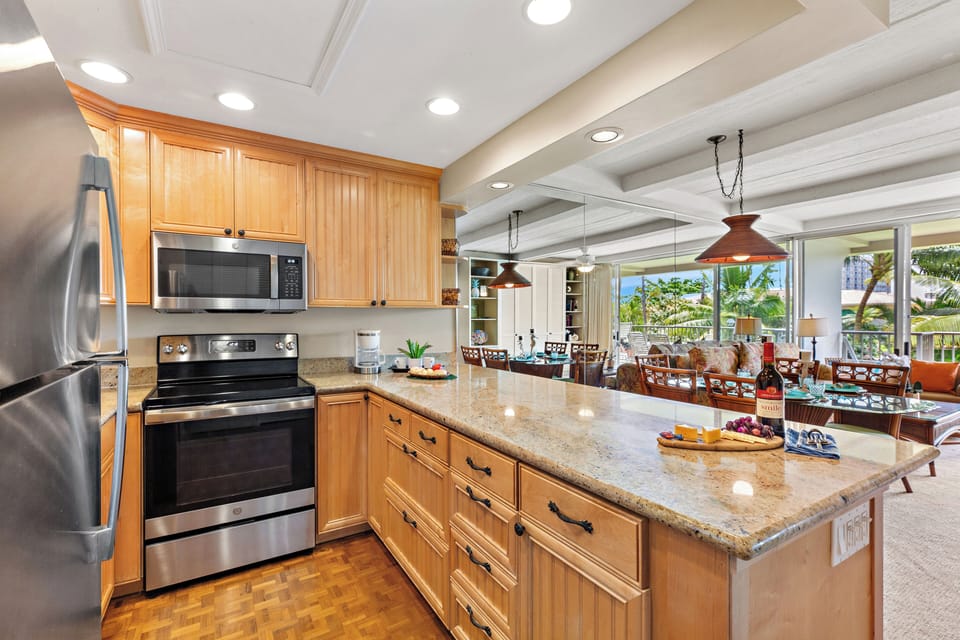 Fully equipped kitchen with a generous breakfast bar, comfortable seating, and modern appliances. Ideal for casual dining or enjoying your morning coffee before a day in paradise.