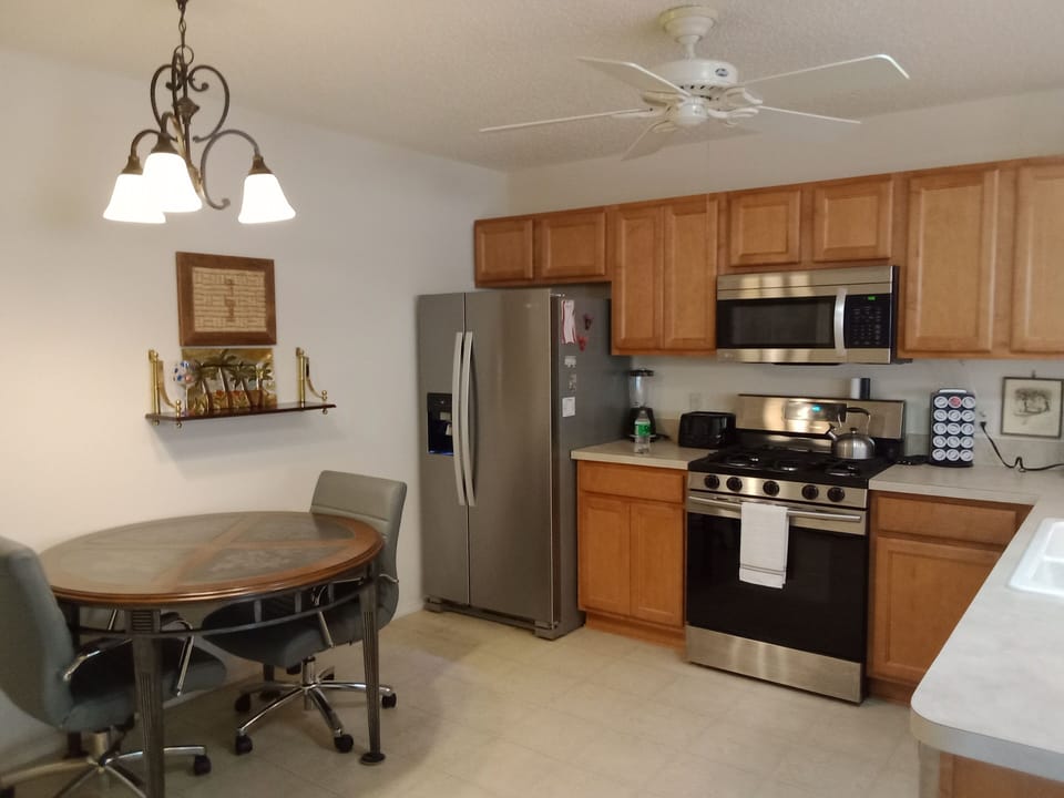 Kitchen with table and 2 chairs