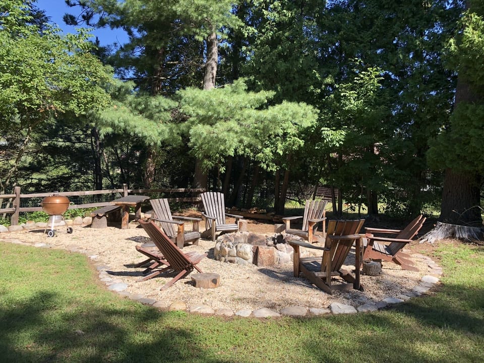 Fire pit and picnic area in side yard