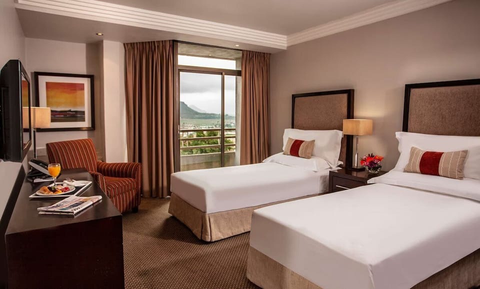 Stretch out with two plush beds and a bright, airy view.