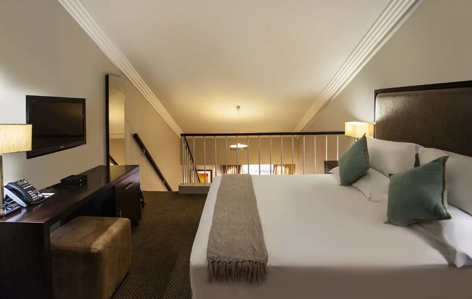Stretch out in a spacious room designed for effortless comfort.