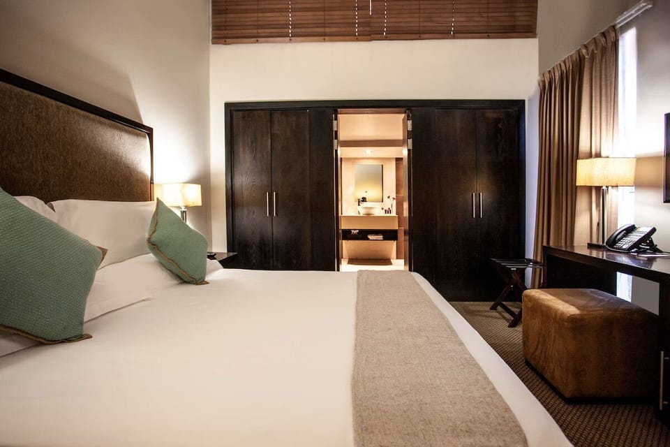 Refresh in a bright bedroom with an easy ensuite flow.