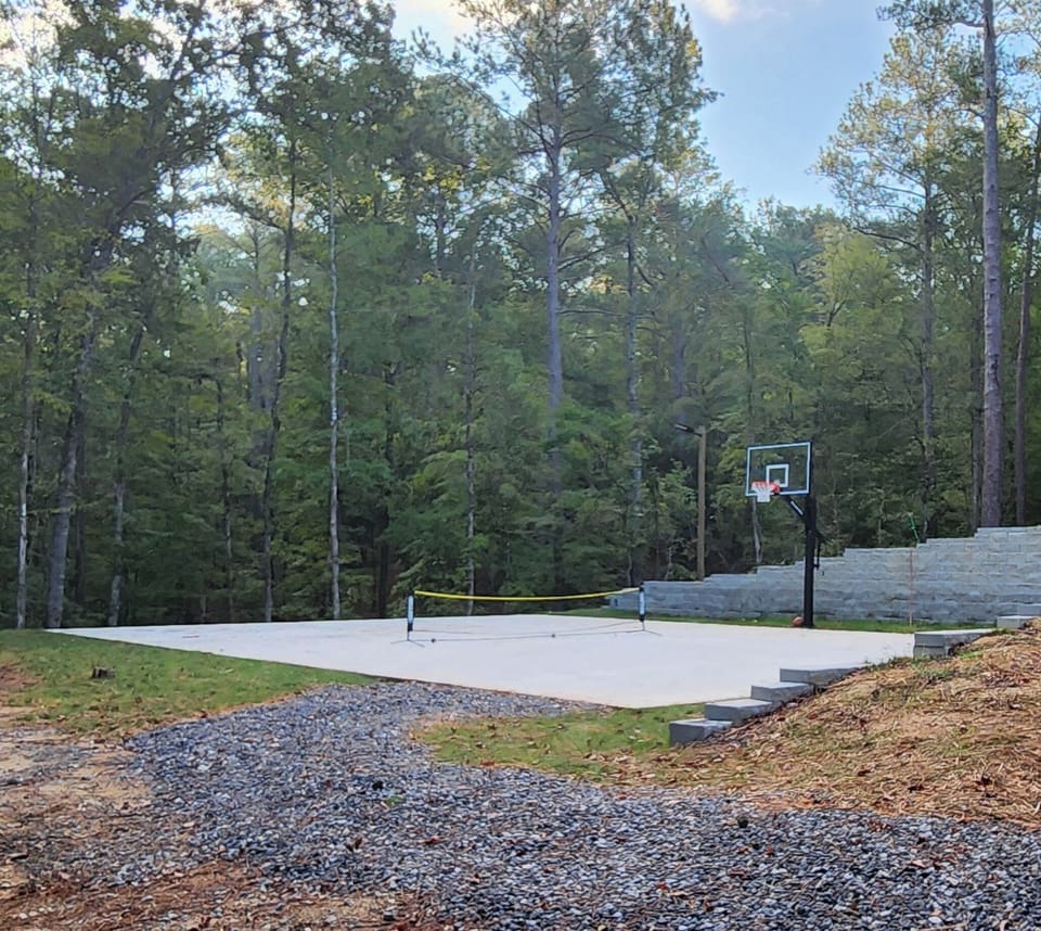 A shared sports court on property is available for pickleball and basketball.