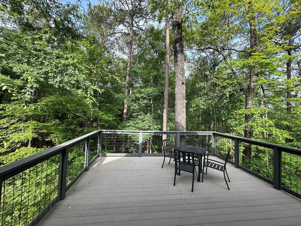 Enjoy coffee or lunch on the private deck up in the tree tops.
