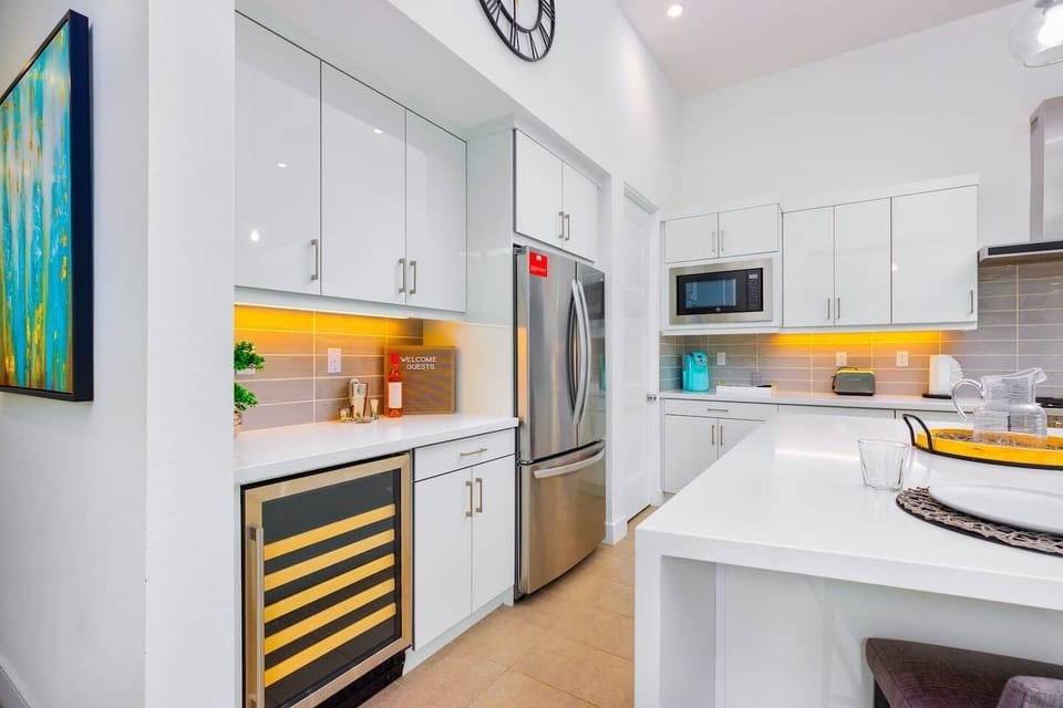 Kitchen is equipped with cooking basics and appliances.