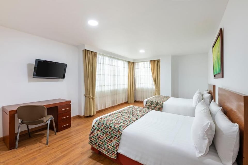 Settle into bright twin beds with plenty of space.