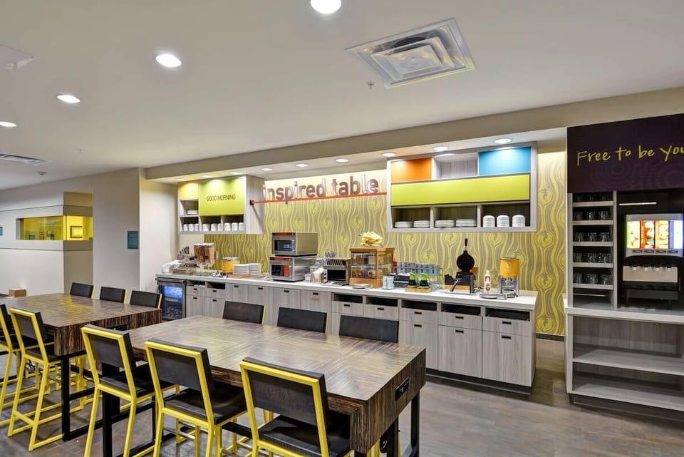 Enjoy a colorful breakfast space designed for easy, social mornings.