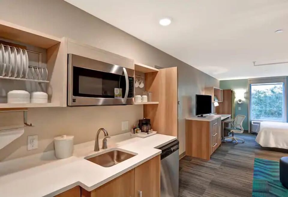 Start mornings easily with kitchenette essentials, sink, and microwave.