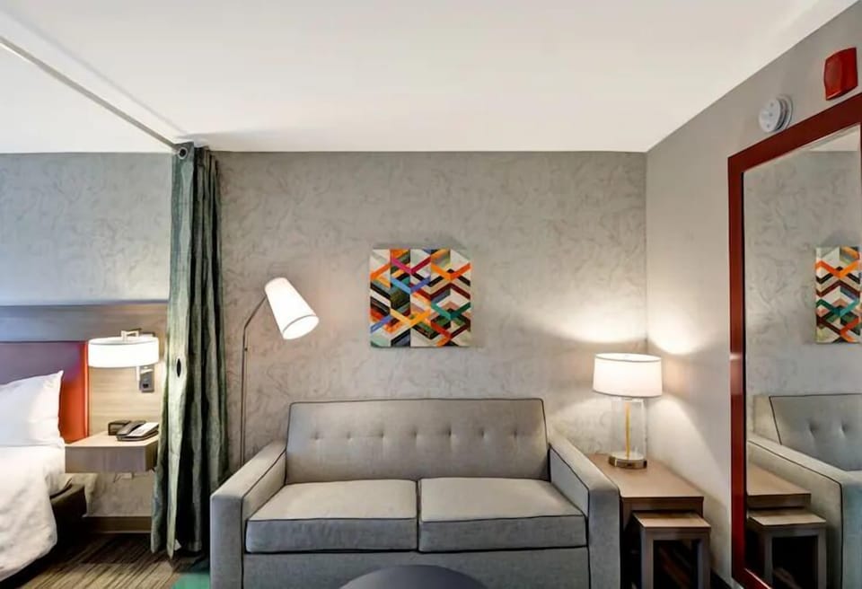 Unwind on the cozy sofa after a day exploring.