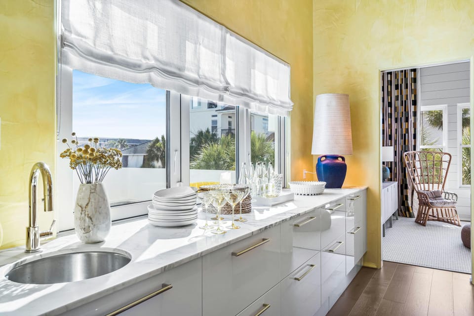 2nd wet bar next to dining area. Opens to the pool deck