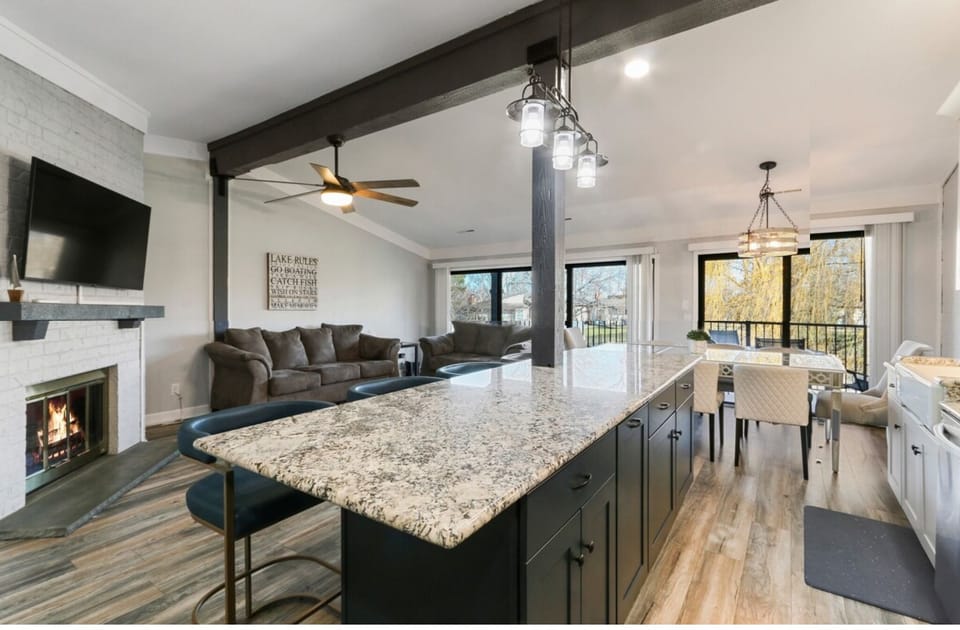 Open concept kitchen, living room to dining area