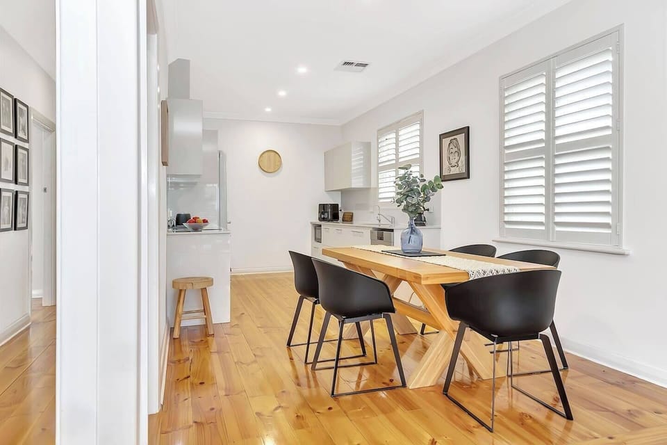 The open-plan kitchen and dining area offer a five-seater table setting where you can share meals.  
