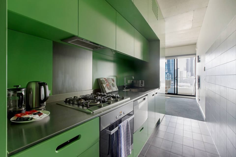 The modern, streamlined kitchen has everything that’s needed to prepare meals, plus a dishwasher for easy clean-up.
