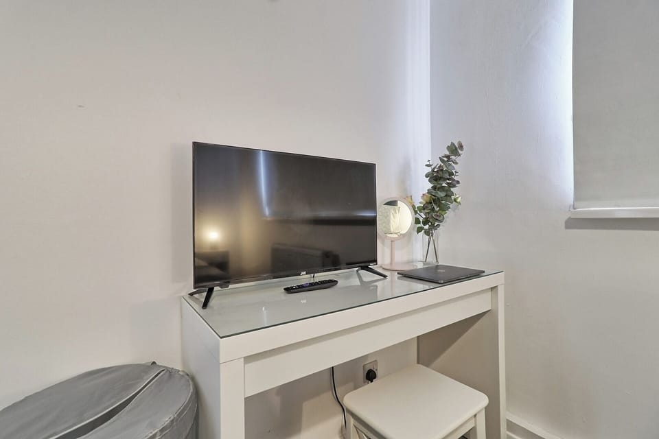 Relax in style and enjoy the convenience of a 50" HDTV.