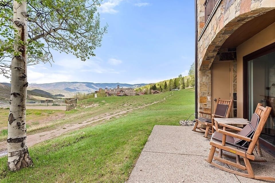 The private deck with views off of the king guest bedroom downstairs.
