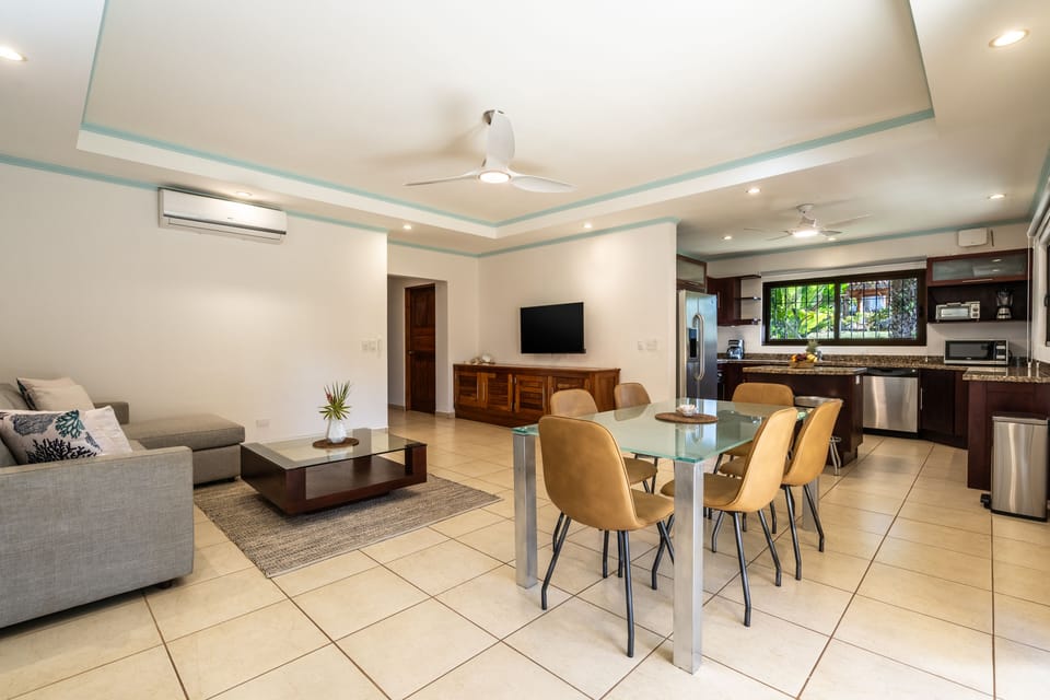 Spacious living area with TV.