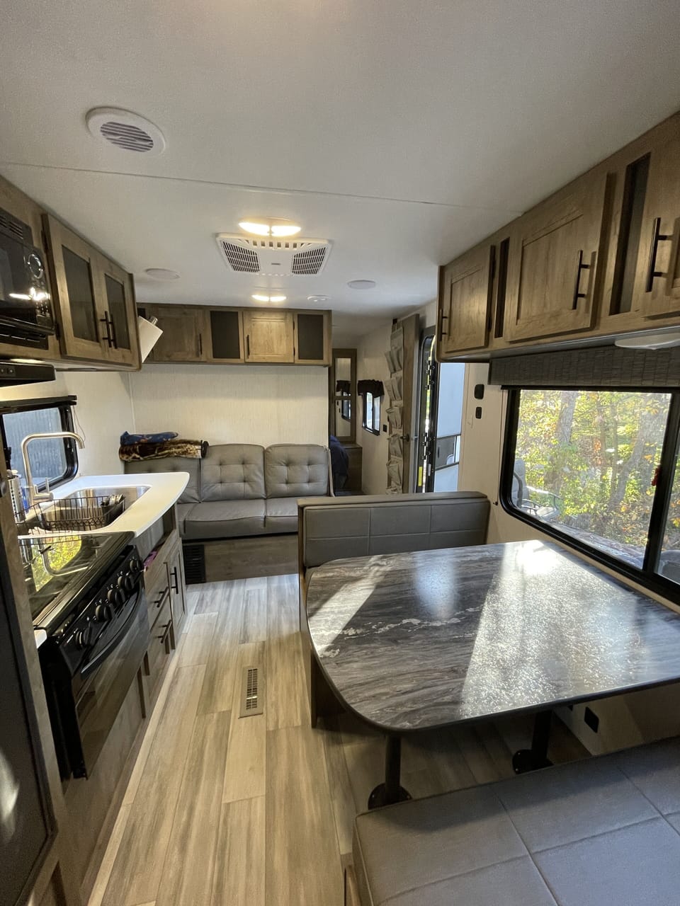 The kitchen table and couch both turn into beds for kids to sleep on