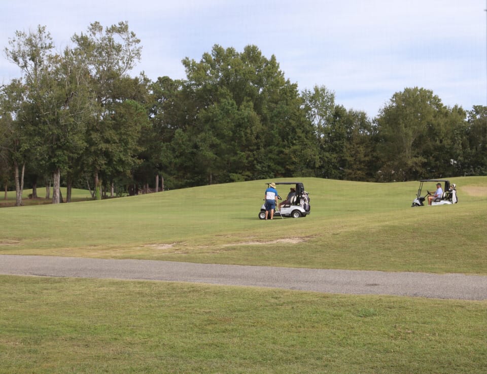 Watch the Golfers from the Screened in Porch