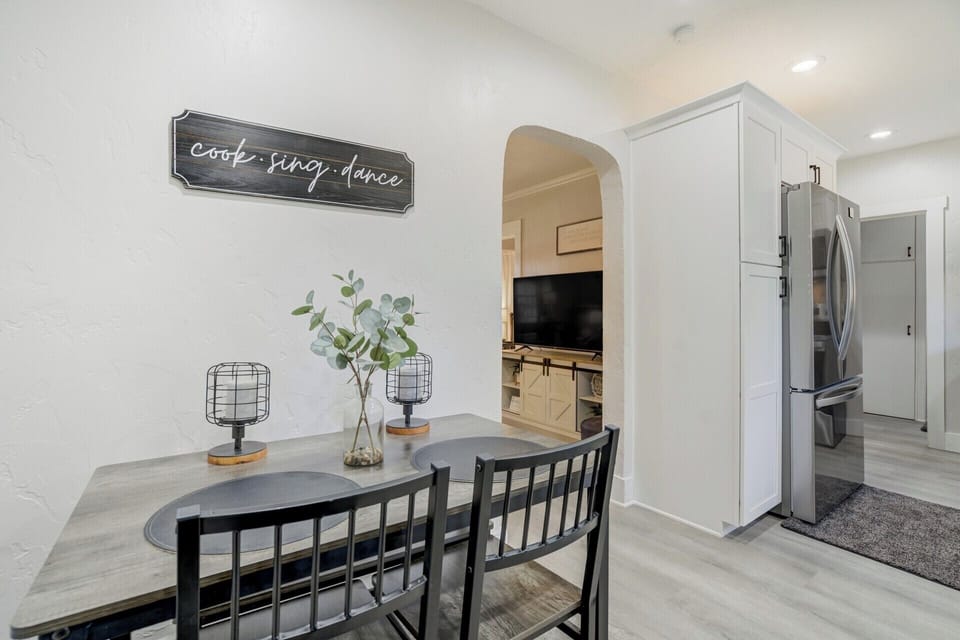 Dining table with 2 chairs and a bench seat under table