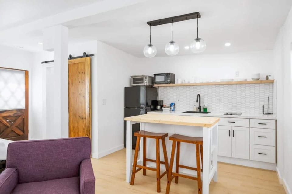 Intimate dining for two, perfectly placed right beside the kitchen for easy meals and great conversation. 