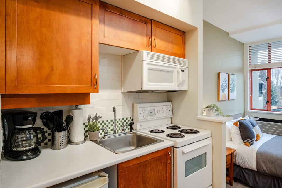Compact kitchenette with all the essentials for easy meals.