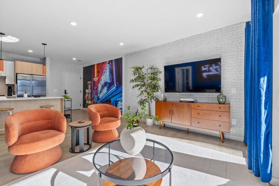 Queen sleeper sofa and 65 inch smart TV