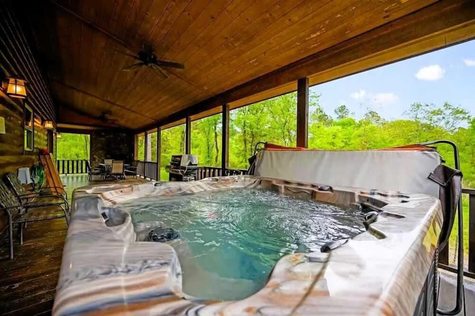 Unwind in the relaxing hot tub on the upper deck.