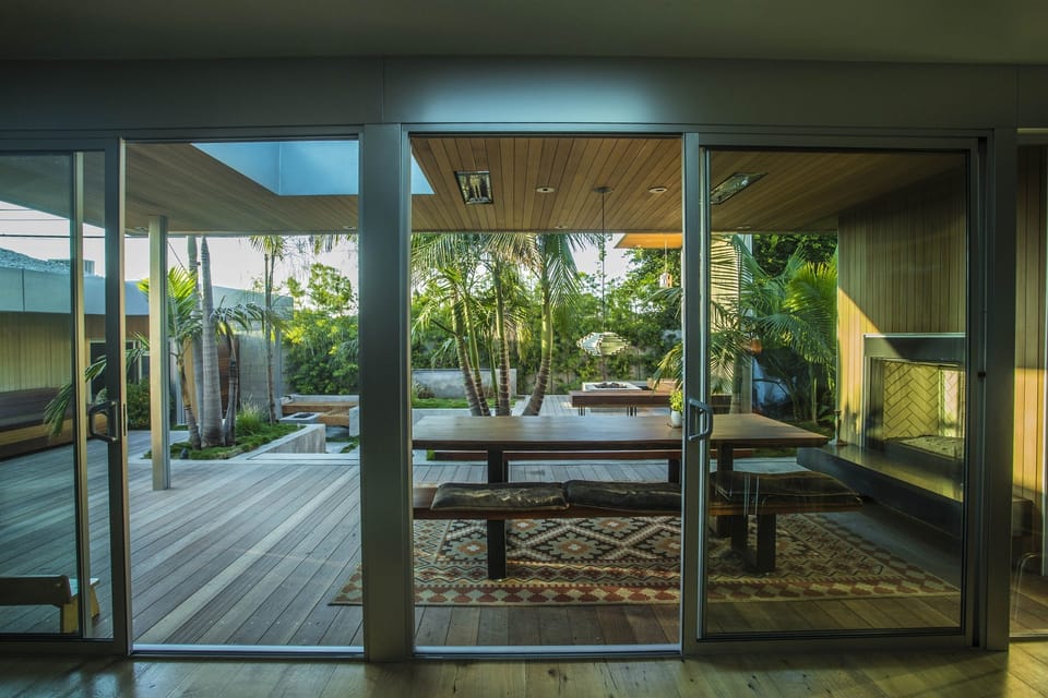 Looking out from the living room to the back deck