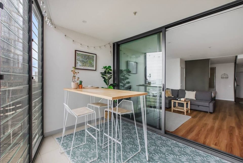 The balcony area is enclosed providing a unique indoor-outdoor feel. 