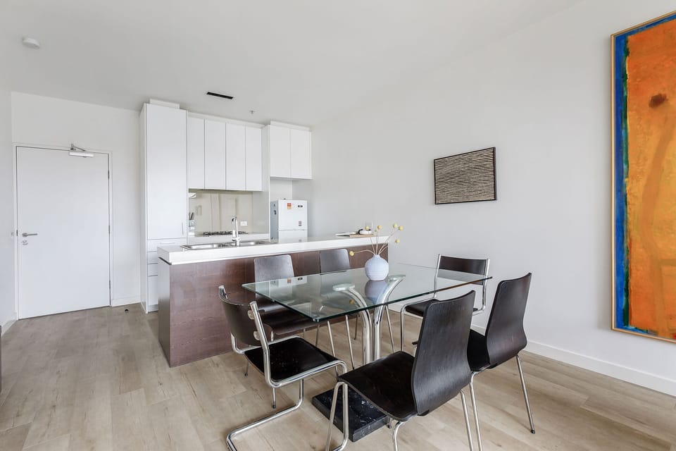 Sit down for a meal together at the glass-topped dining table.