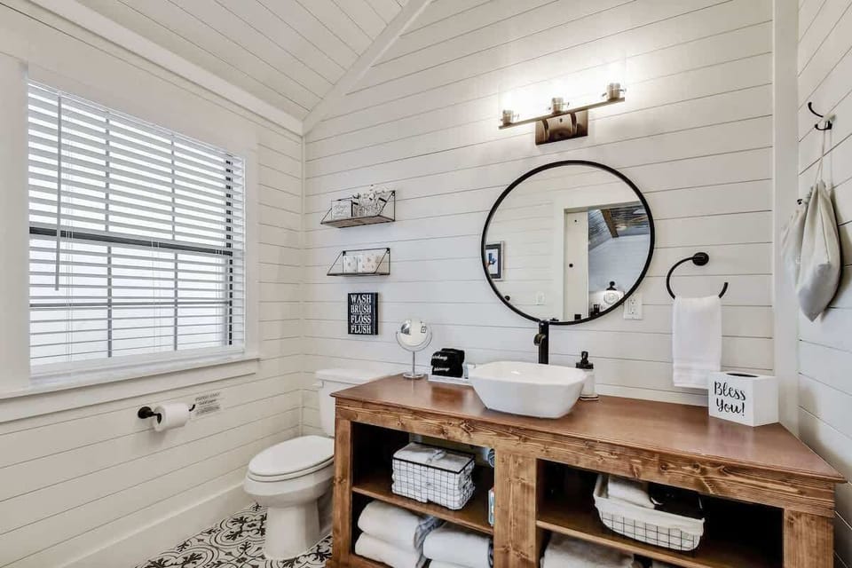 Full bathroom with modern touches.
