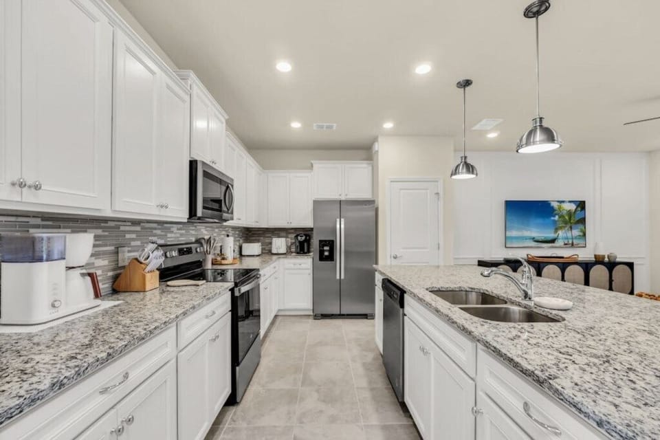 - Modern kitchen - granite counters, stainless appliances, and sleek backsplash for gourmet cooking  