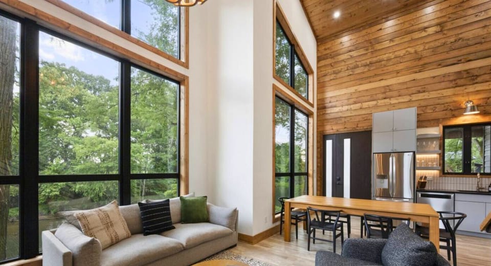 Comfortable seating and plenty of natural light make this living room a great spot to unwind.