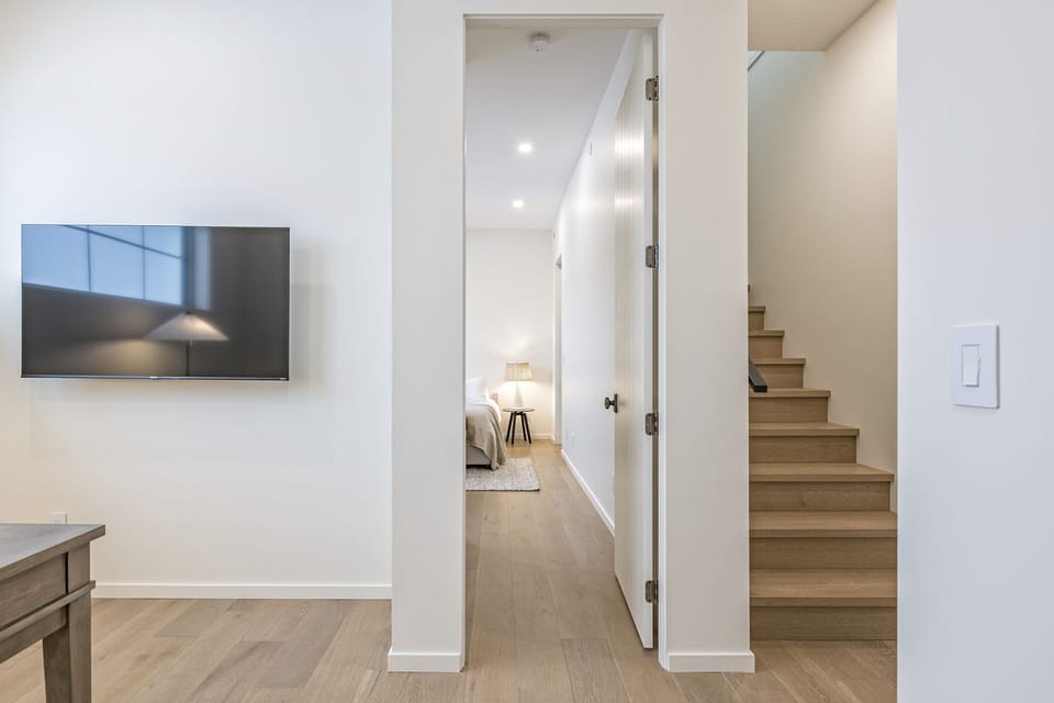 Just off the Office a Queen Bedroom and the Stairs to More Bedrooms 