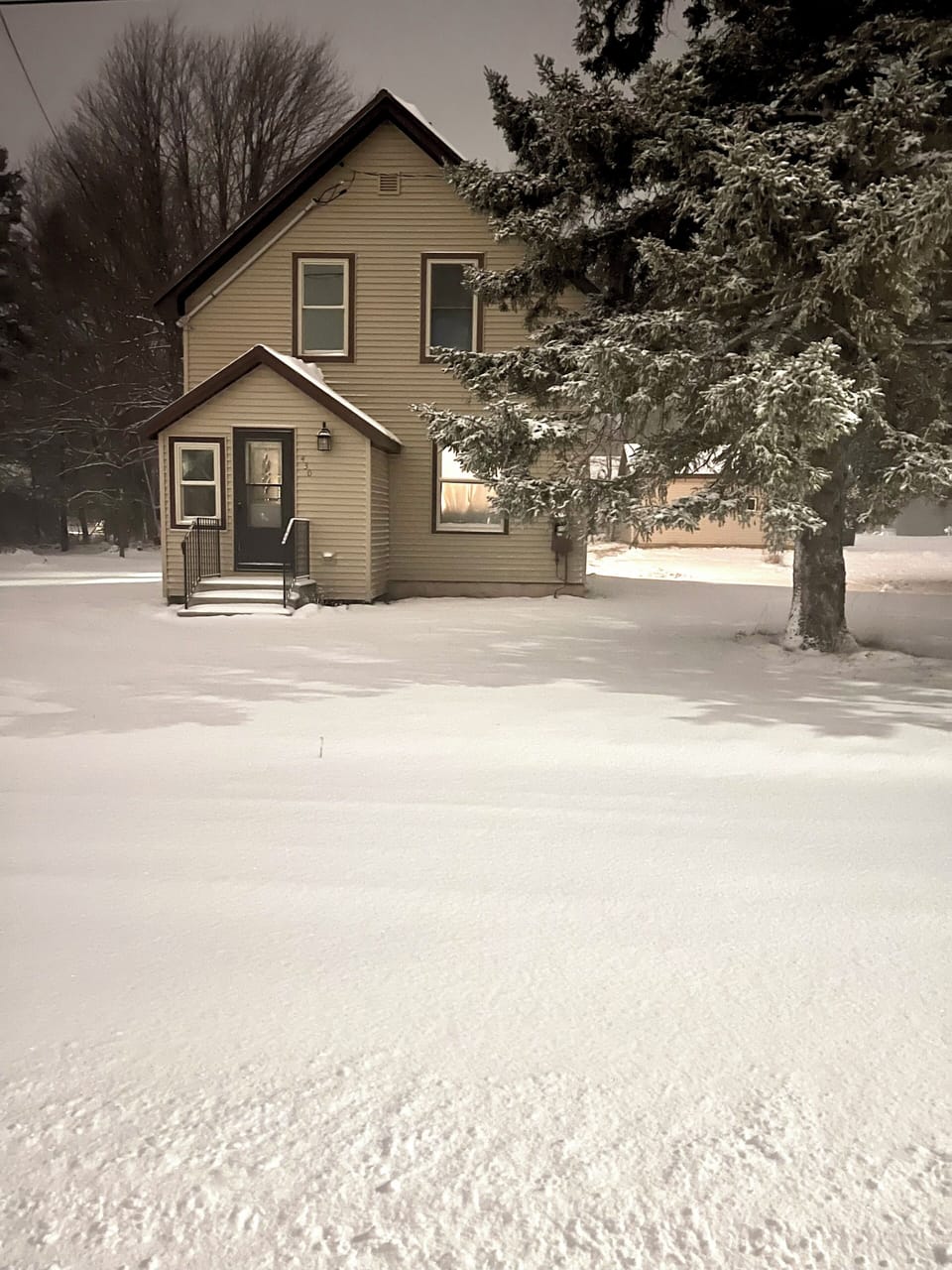 Front of house with snow!