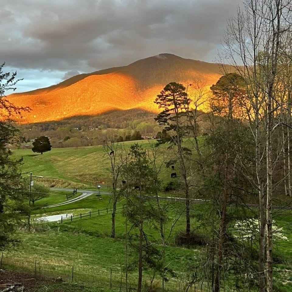 Enjoy breathtaking  sunset views reflecting against Cove Mountain from our deck!