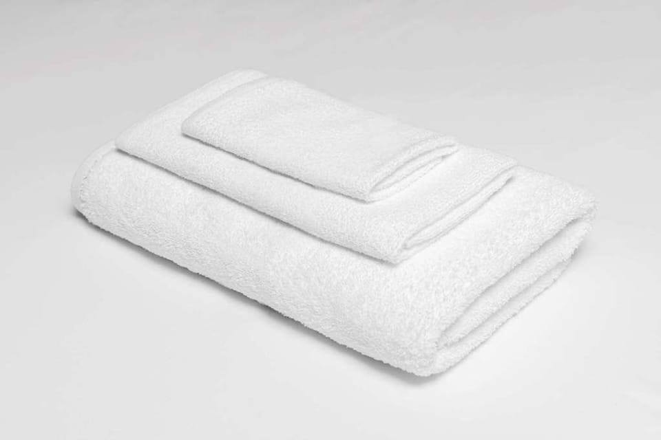 Wrap up in plush, fresh towels after a soothing shower.