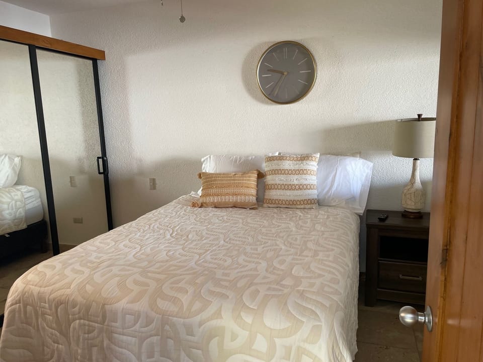 Main Floor Bedroom (Queen Bed)
and Office Nook