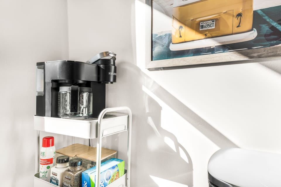 Keurig Coffee Machine. Compliantly coffee pods and sweetener. 