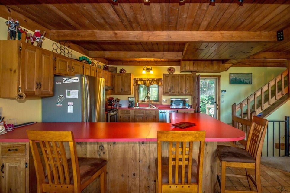 Fully equipped kitchen with everything you need for a great family meal, plus coffee and tea to start your day. Enjoy cooking indoors or fire up the grill on the back deck while taking in the views.