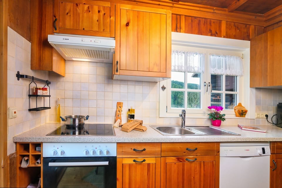 Kitchen with oven and microwave