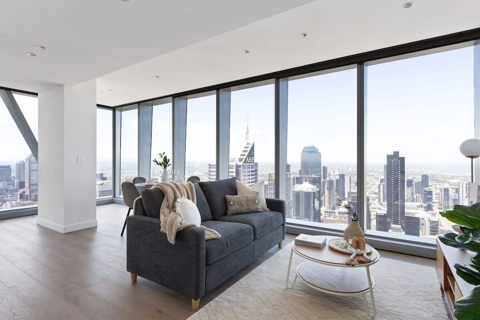 A spacious living area with a 3-seater sofa bed.