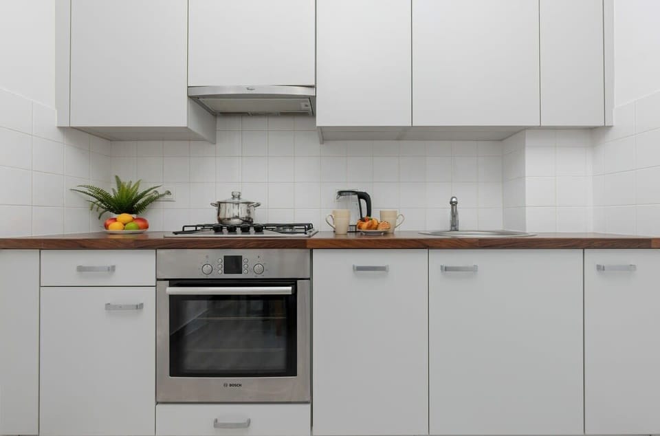 Separate kitchen with a dining table