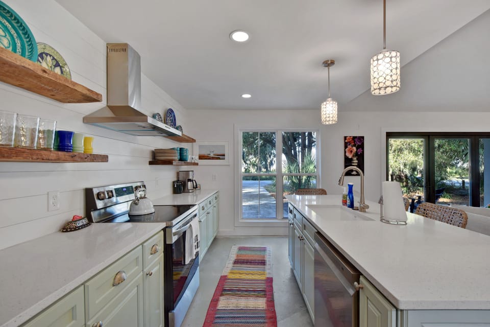 Kitchen Island and Morning Light - Long counter space connects the kitchen to the dining area and main living room.