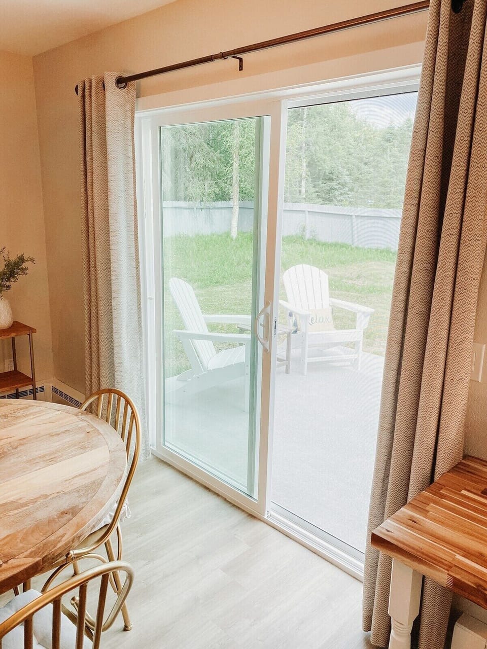 Sliding glass doors off the dining area that lead out to your back, private patio with BBQ.