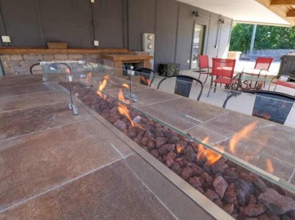 Step outside to the fire table and enjoy a meal or just great conversation.